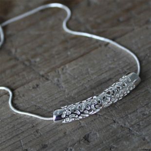 silver necklace and pendant