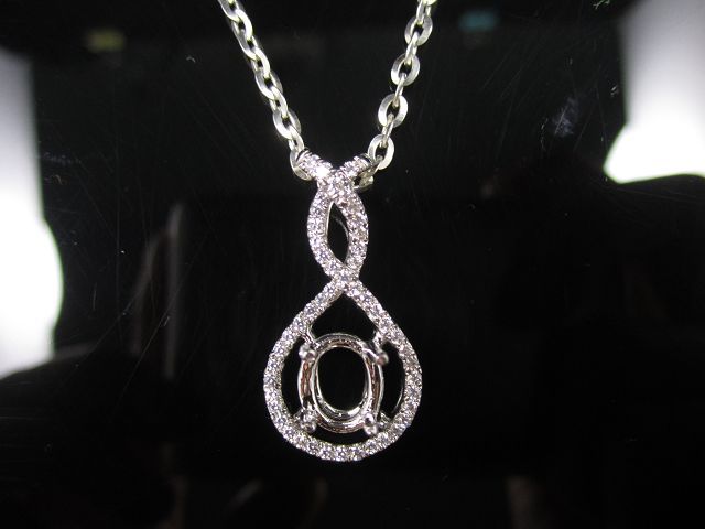 Diamond meleed pendant / white gold pendant / emeral center stone/braid pendant