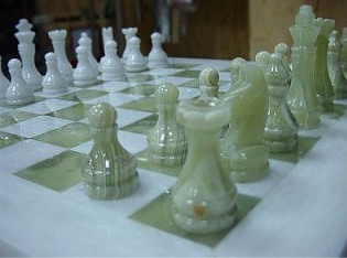 Green / White Onyx Chess set. Dimensions: 16&quot; x 16&quot; Base x 1&quot; H. figur