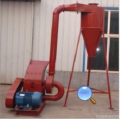 Blower style hammer mill