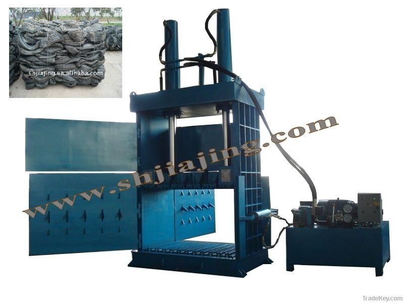 Tire baling press