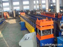 Highway guard rail forming machine