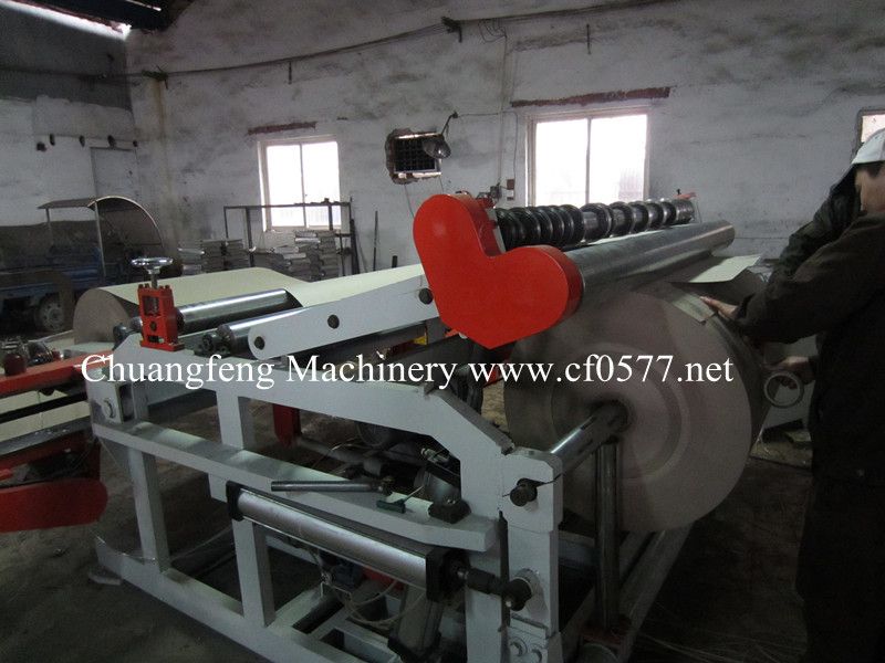 Paper roll sitting rewinding machine