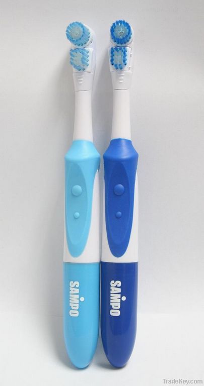 dual action head battery operated toothbrush