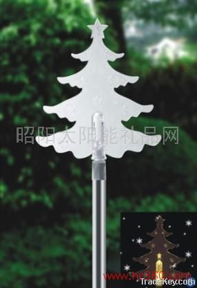 The solar lamp with Christmas tree edge of insert plane