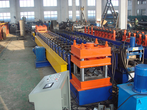 Highway guard rail forming machine