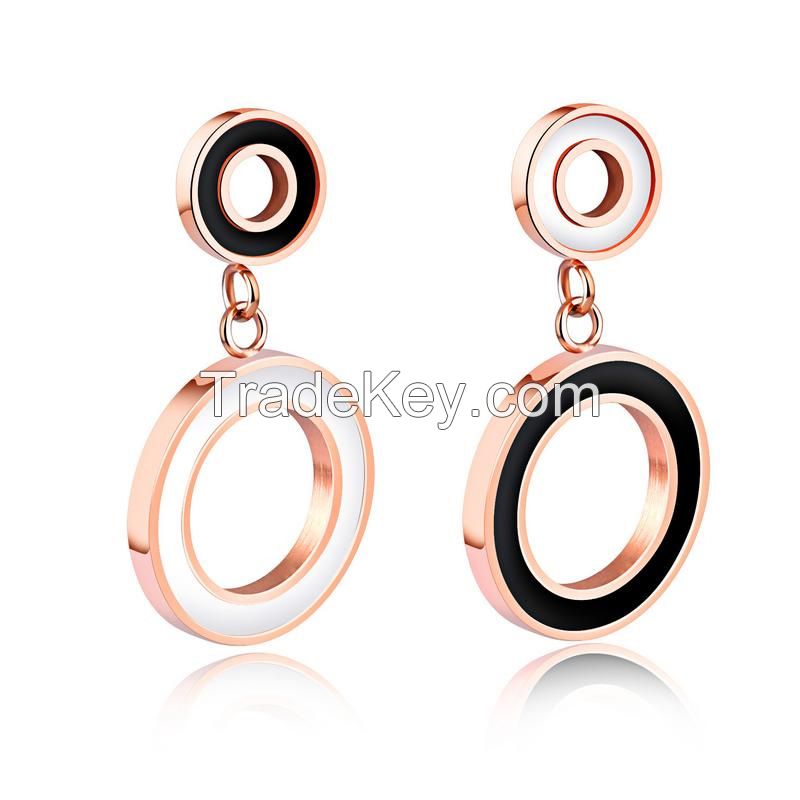 Designer inspired gold tone stainless steel fashion dangling earrings