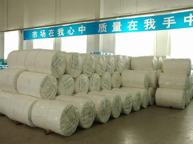 Hot-melt adhesive laminated nonwoven