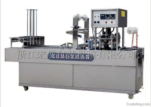 AUTOMATIC CUP FILL-SEAL-CUT MACHINE