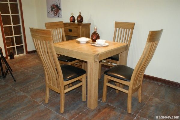 solid oak dining table and chairs