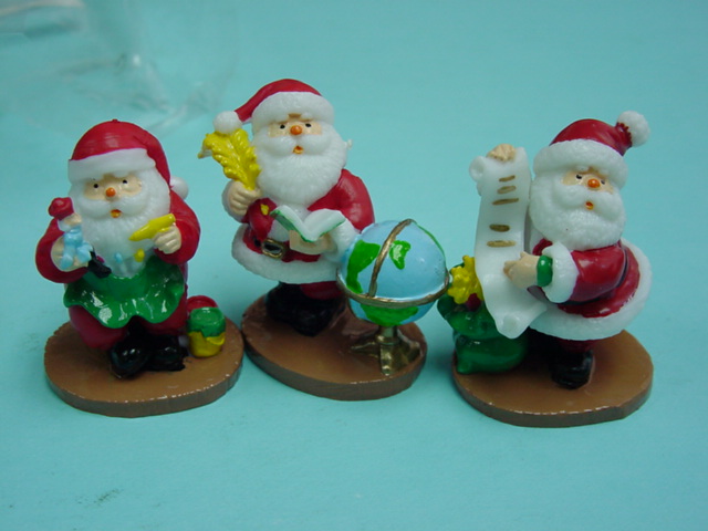 Plastic 2 inches 3 assorted Santa with Base and Pick