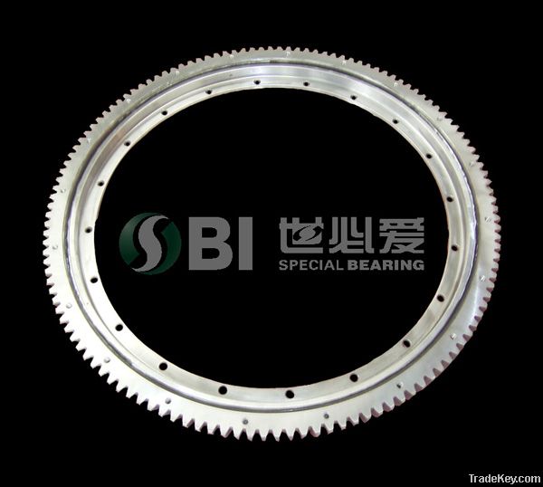 Single row four point contact ball bearing, with external gear &amp; flange