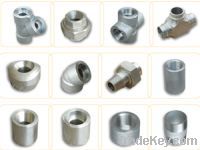 Forged steel pipe couplings