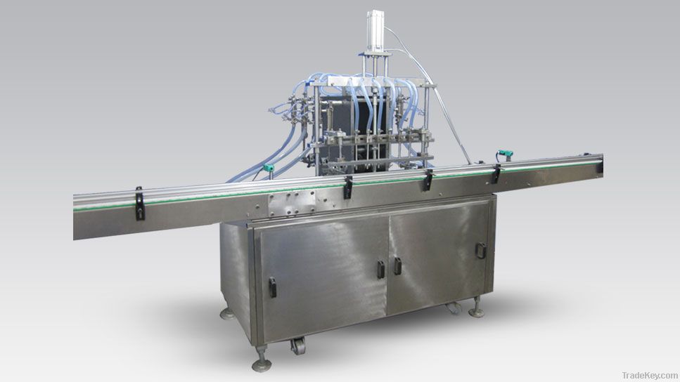 Automatic Six Head Liquid Filling Machine.