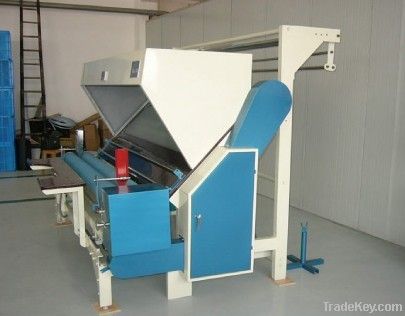 Cloth inspection machines and rewinding machines