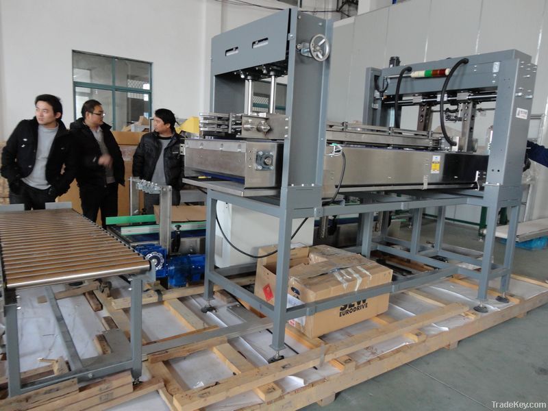 Wrap-around case packing machine