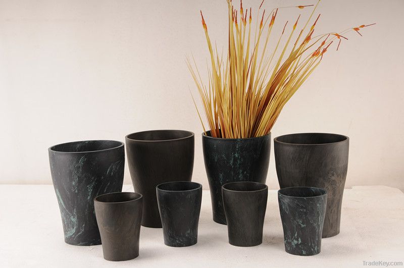 plastic, wood and stone flower pot