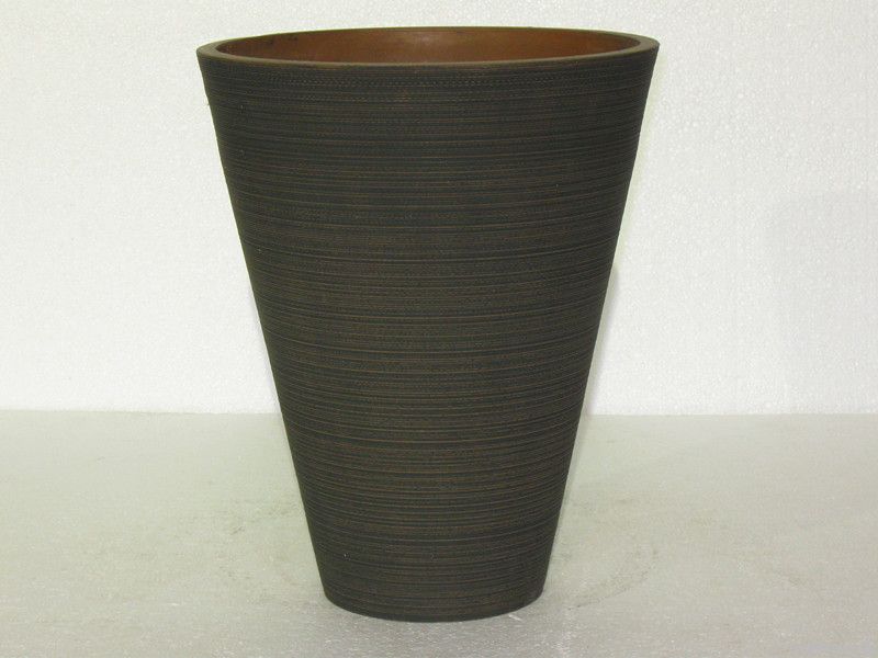 plastic, wood and stone flower pot