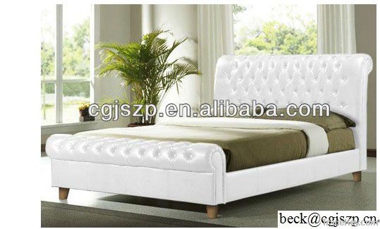 white faux leather bed with crystals