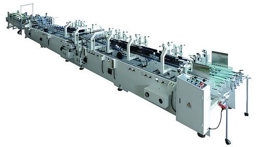 High speed folding and gluing machine