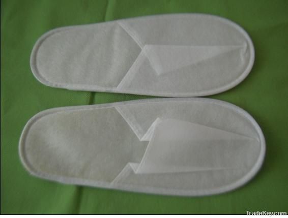 Non woven disposable slippers