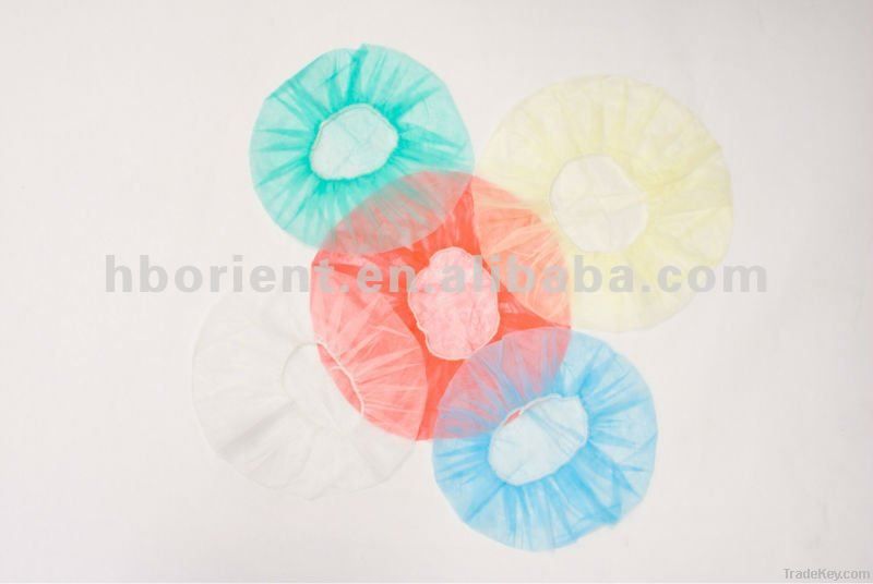 Disposable nonwoven bouffant cap