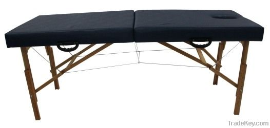 Wooden massage therapy table