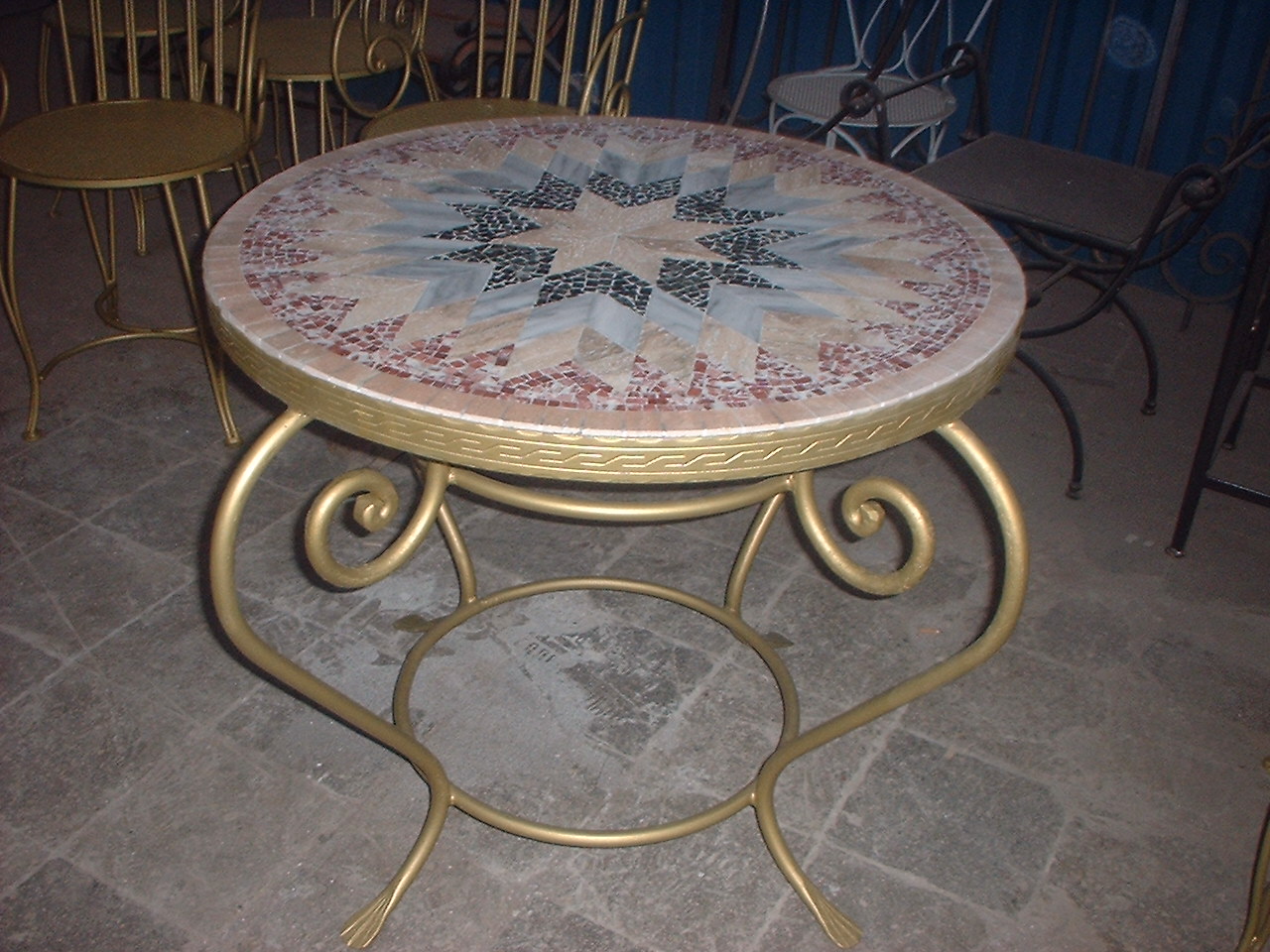 wrought Iron tables with stone mosaics