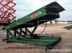 Stationary hydraulic yard ramp/leveler