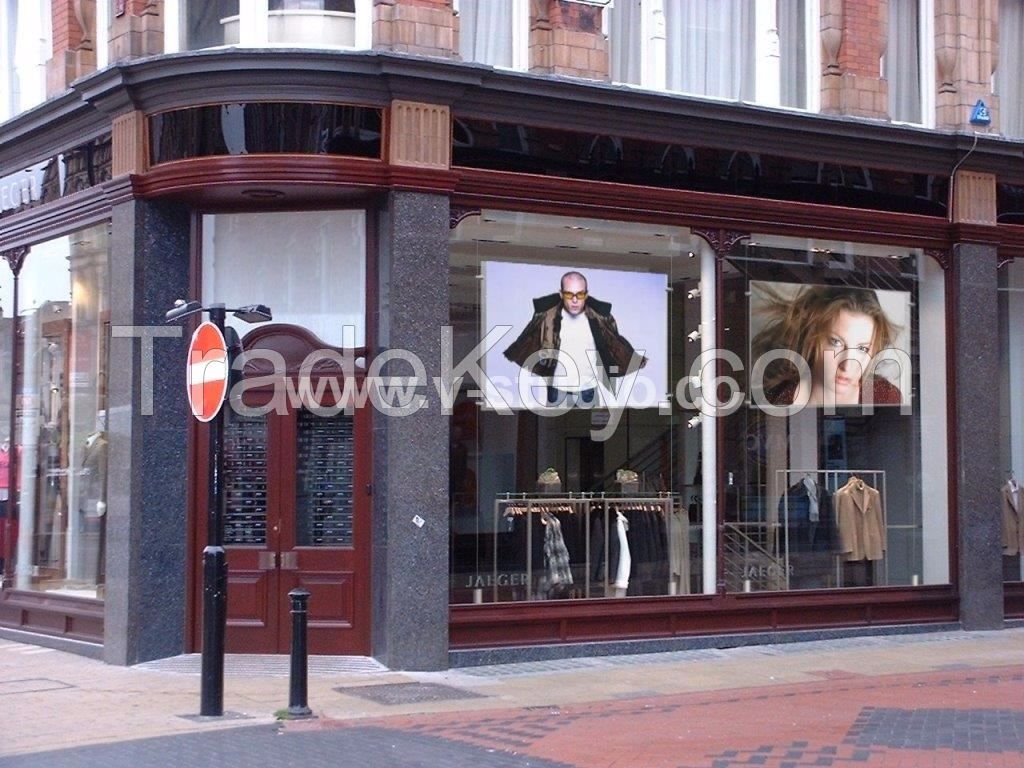 Rear projection film screens for shop windows by V-Studio