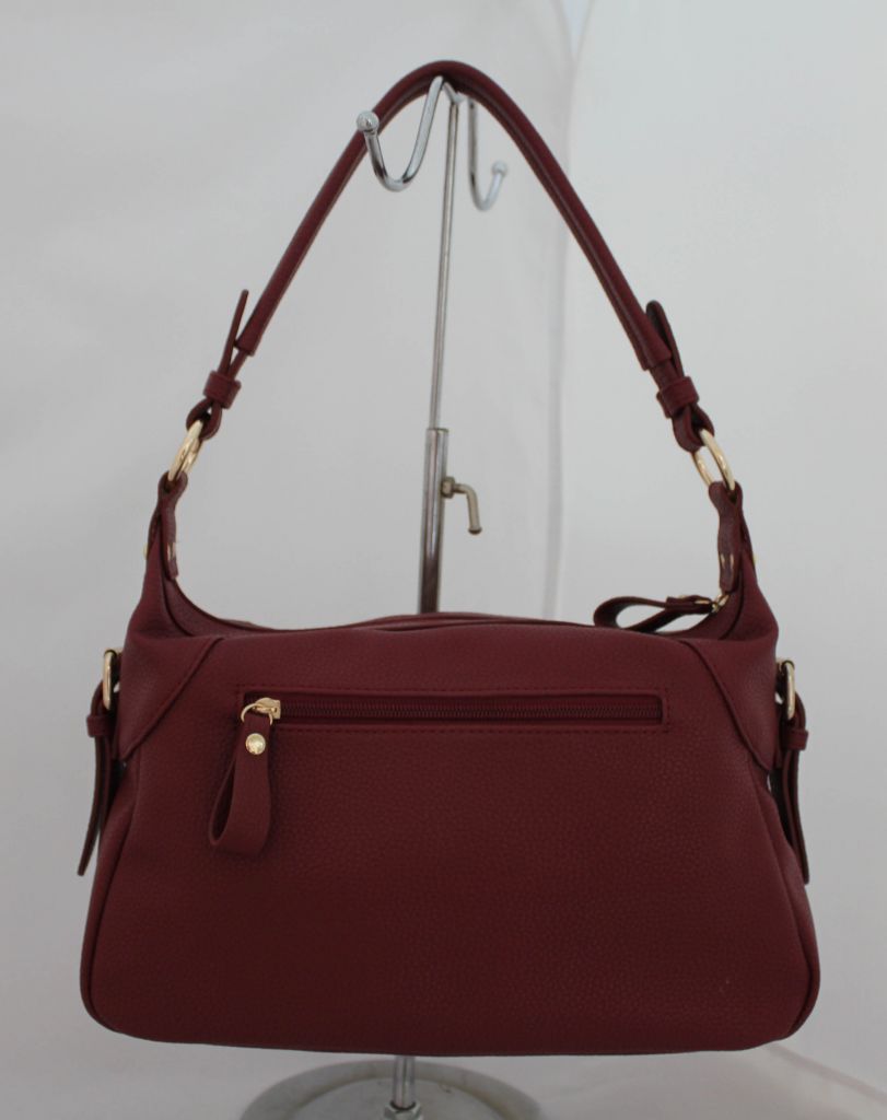 Side buckle strap shoulder bag