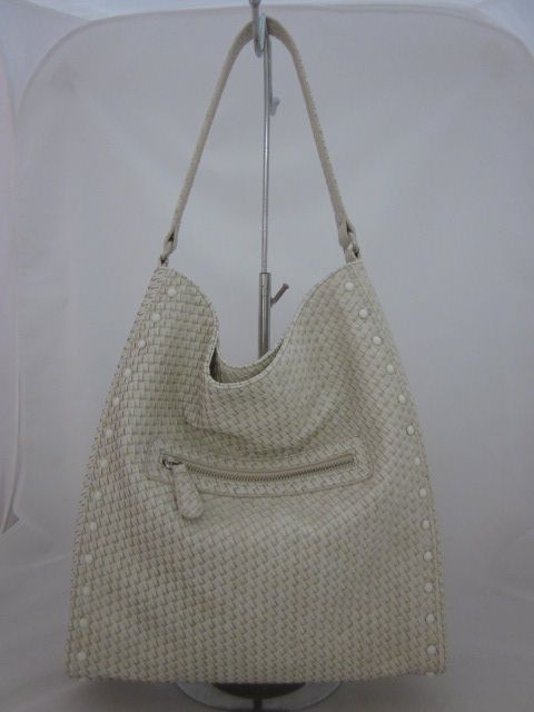 Dome studs outlined shoulder bag