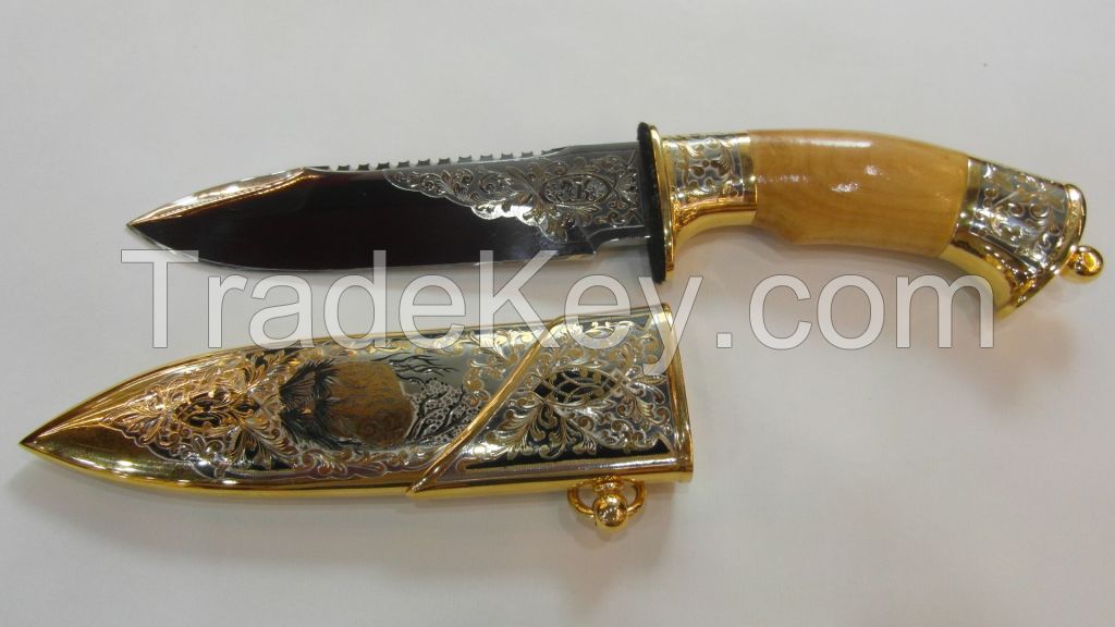 The knife souvenir, decorated in all-metal sheath