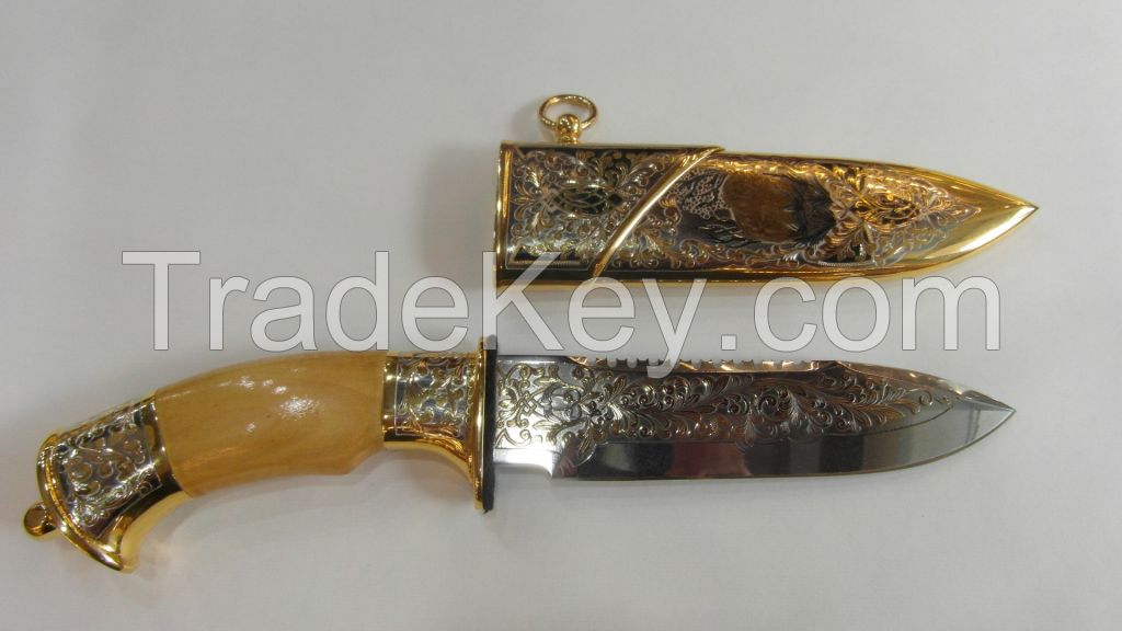 The knife souvenir, decorated in all-metal sheath