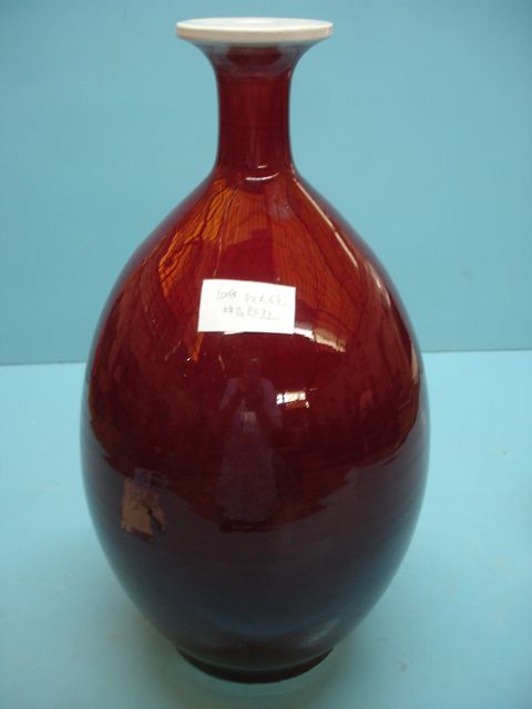 Chinese red porcelain vase, festive ceramic decoration