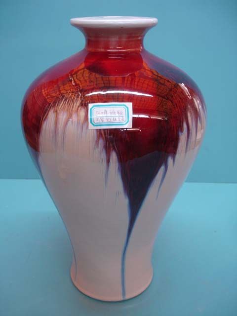 Chinese red porcelain vase, festive ceramic decoration