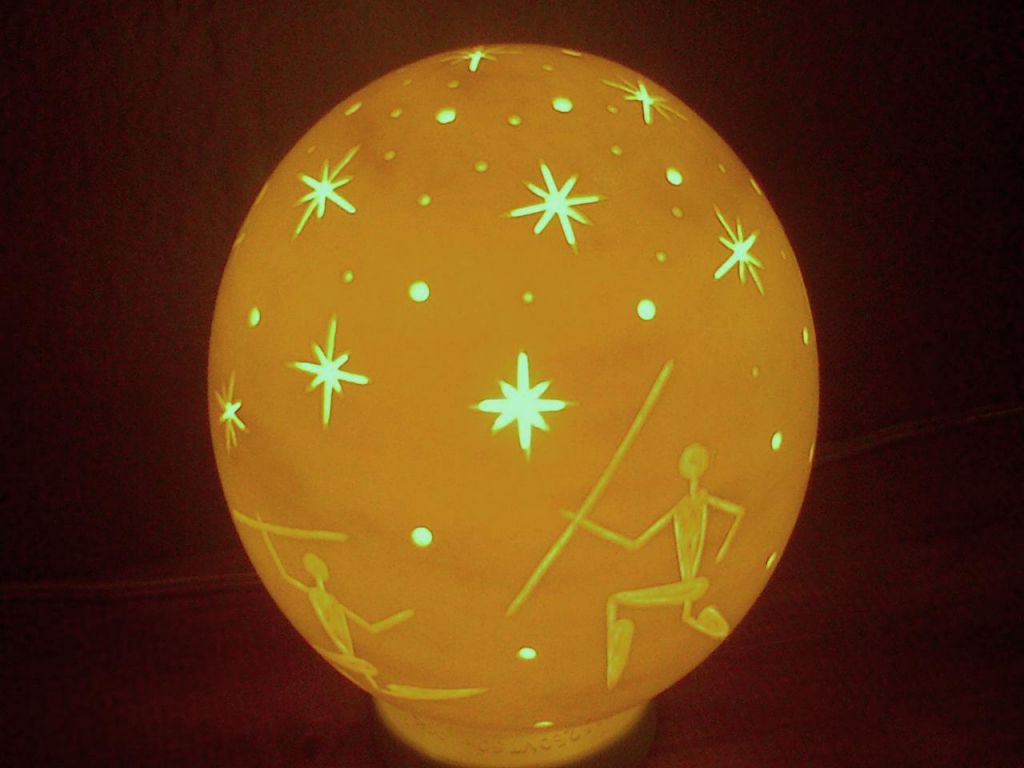 Stars and bushmen rock art hand carved ostrich egg lamp shade