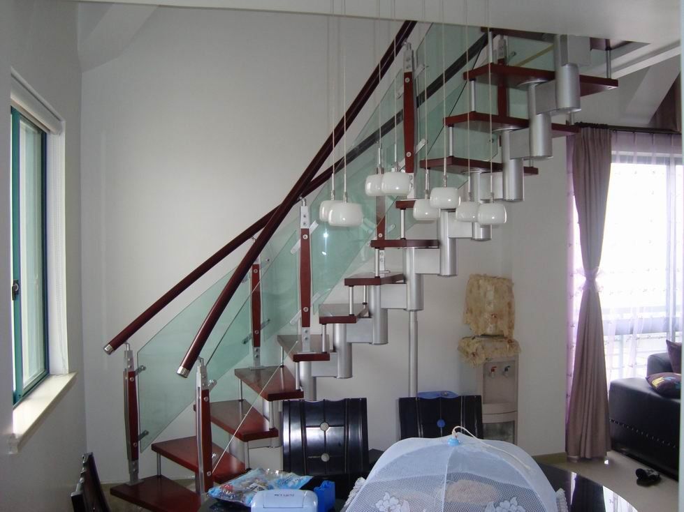 Stainless steel curved glass staircase