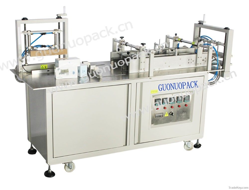 Pneumatic cellophane film packaging machine