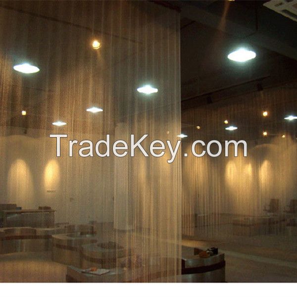 metallic coil drapery/hanging room divider