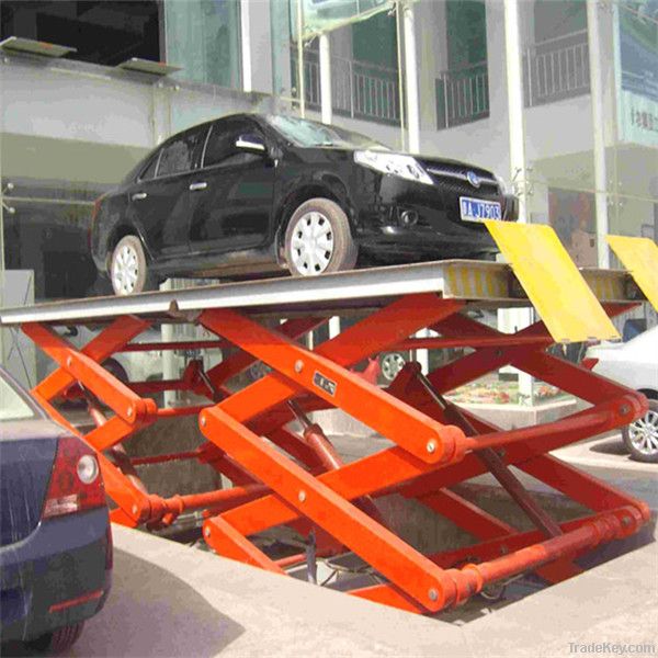 stationary vertical car lift in car garage