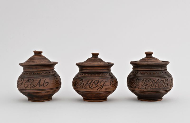 Ceramic pot set of three pots made of red clay. 