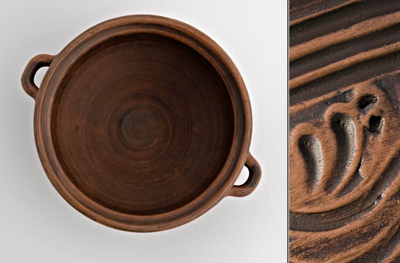 Ceramic clay bowl made of red clay.