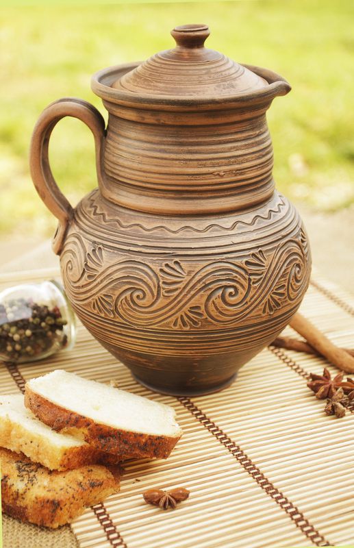 Clay jug, jar, pitcher with a lid.