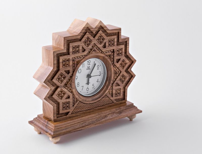Desk wooden clock with hand carved pattern.