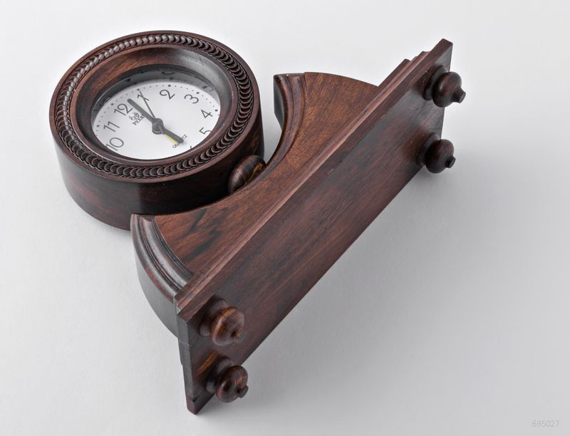 Desk wooden alarm clock with hand carved pattern.