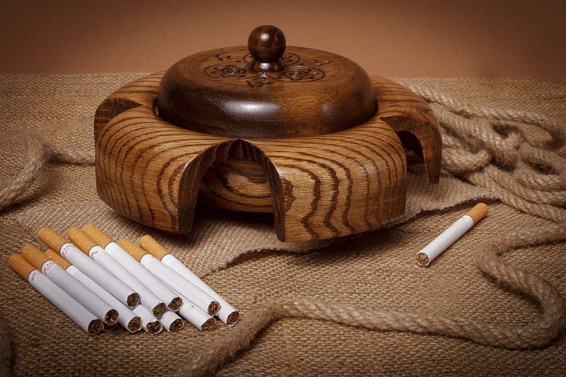 Wooden table cigarette ashtray.