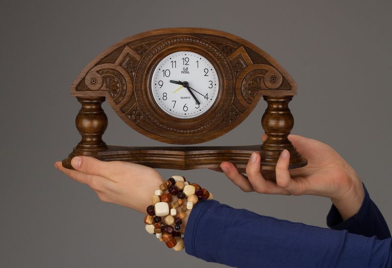 Desk wooden clock made by hands.