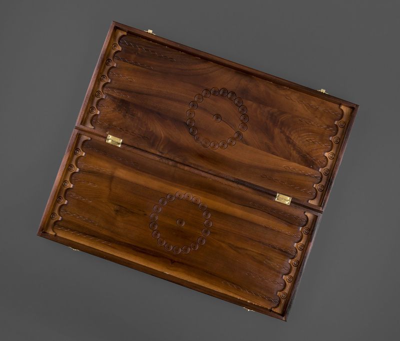 Wooden backgammon with hand carved pattern