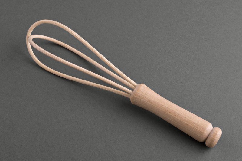 Wooden whisk made by hands.